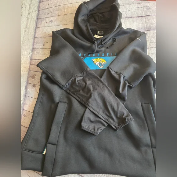 NIKE NFL JACKSONVILLE JAGUARS BLACK WITH TEAL LOGO HOODIE ON FIELD MENS SIZE XL